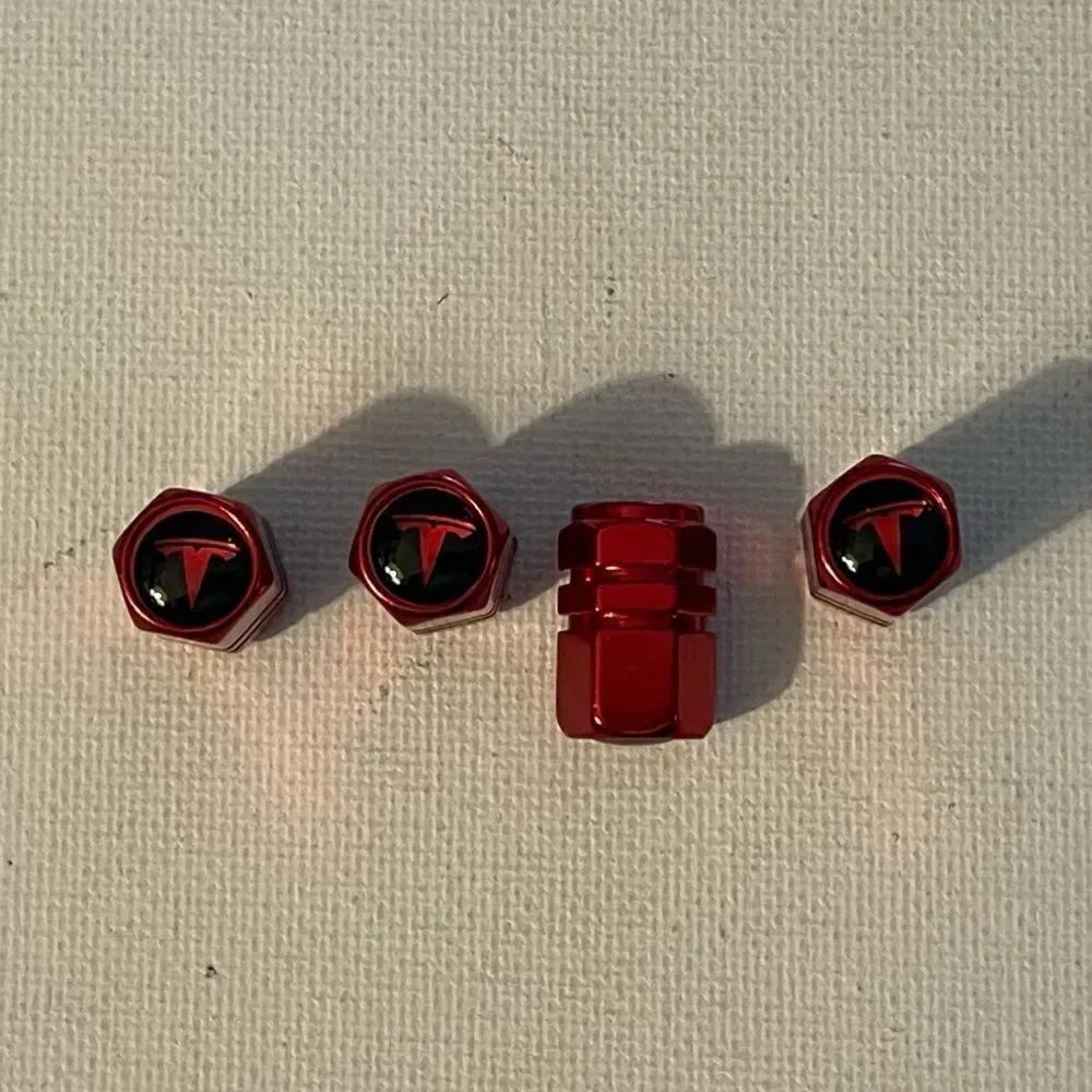 Tesla valve Stem caps in Red set of 4 NWT